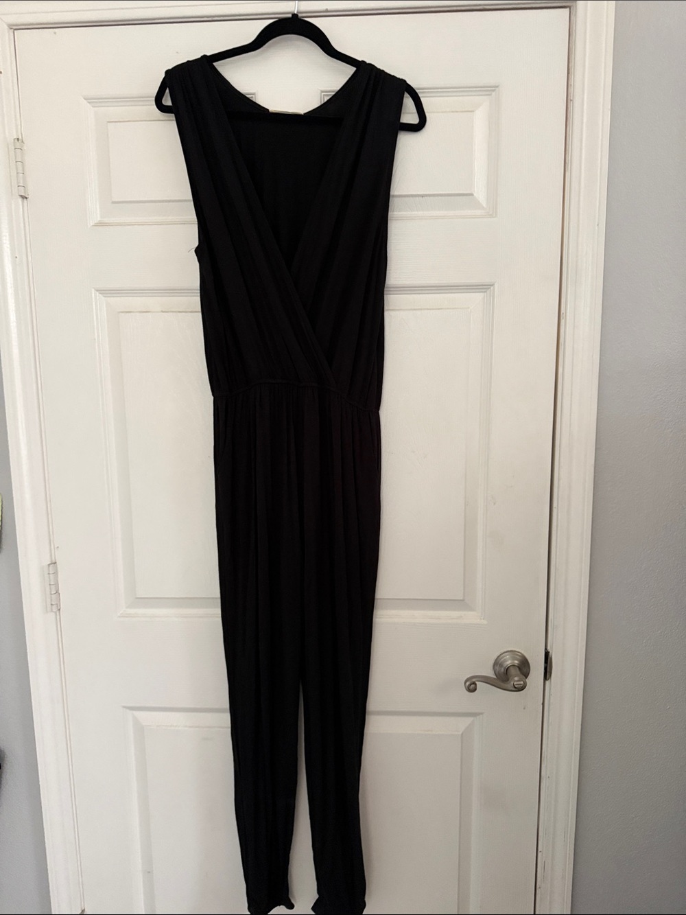 eesome Black Sleeveless Wrap-Front Jumpsuit